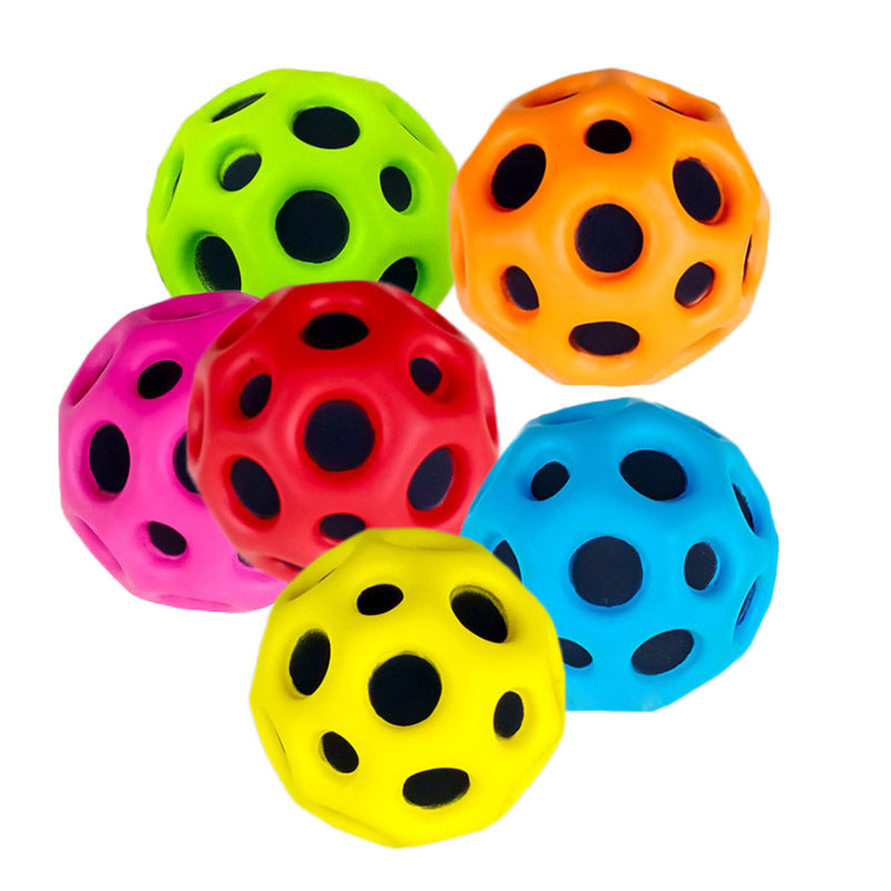 Meerdere stressballen in diverse kleuren verspreid over een oppervlak