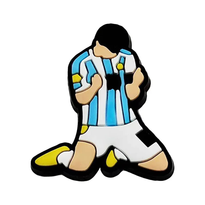 Croc-versiering met Lionel Messi in een pose waarbij hij op zijn knieën zit